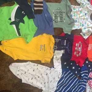 Over 50 pieces of baby boy clothing